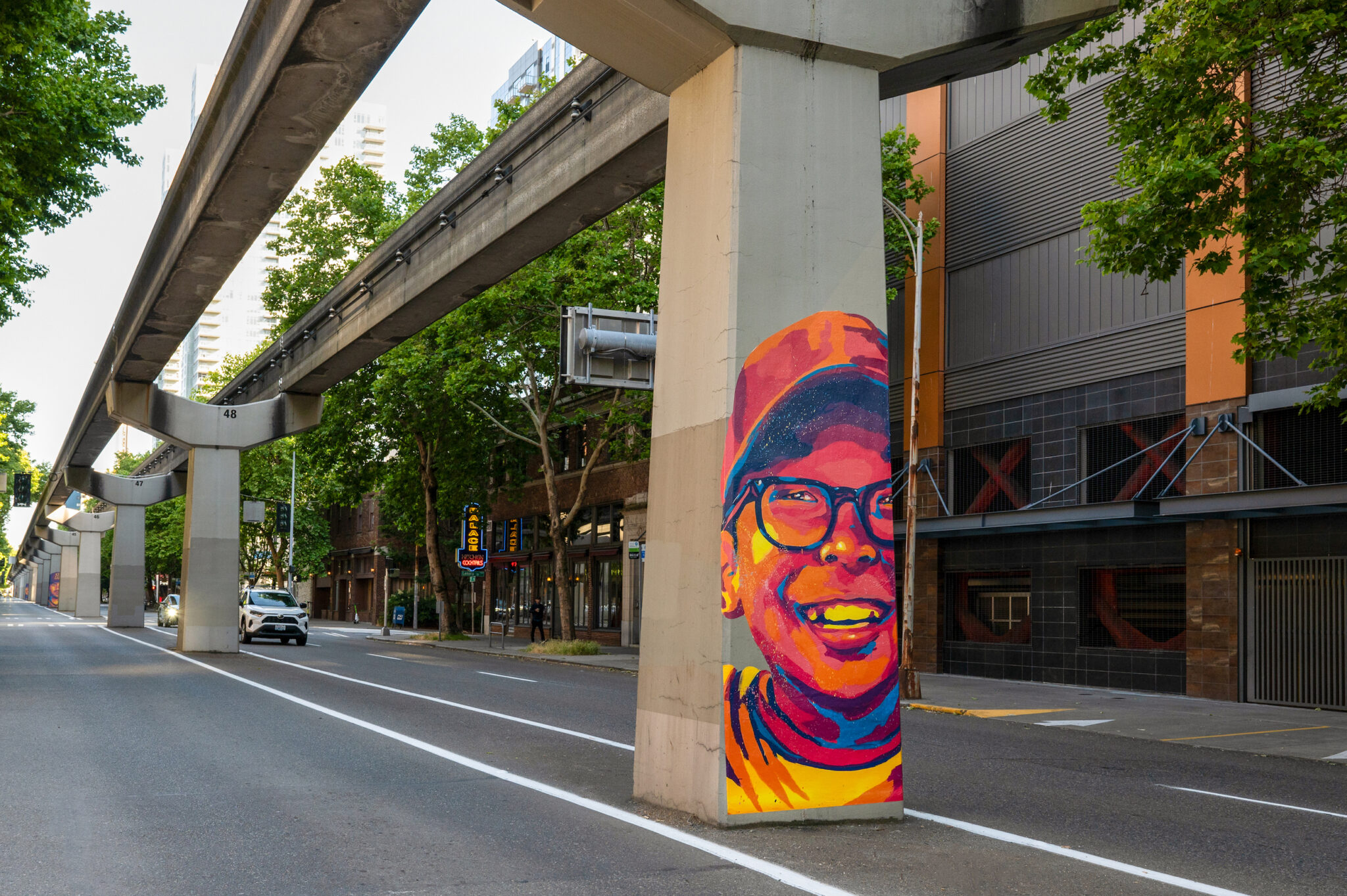 Seattle sports fan mural on monorail column